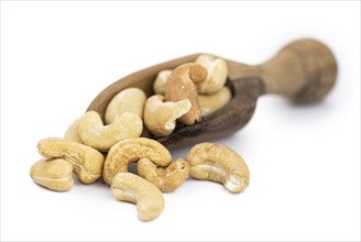 Cashew Nuts isolated on white background (close up shot, selective focus)