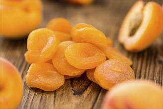 Portion of fresh Dried Apricots (close-up shot, selective focus)