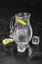 Some chilled sparkling water (detailed close up shot, selective focus)