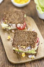 Tuna sandwich with wholemeal bread (selective focus, close-up shot)