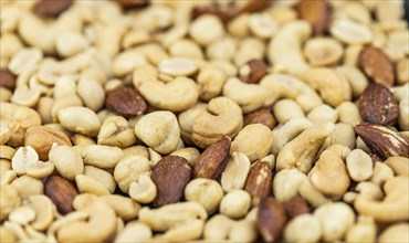 Roasted and salted nuts for use as background image or as texture (close up shot)