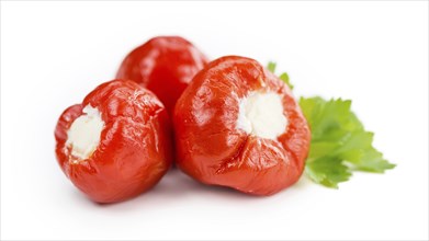 Fresh made Red Pepper (stuffed with cheese) isolated on white background (close-up shot)