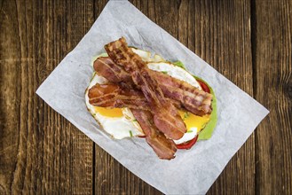 Portion of Bacon and Eggs (selective focus, close-up shot)