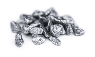 Heap of silver nuggets isolated on white background (close up)