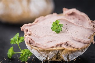 Liverwurst Sandwich on a vintage background as detailed close-up shot (selective focus)