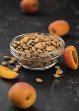 Portion of shelled Apricot Kernels (close up shot, selective focus)