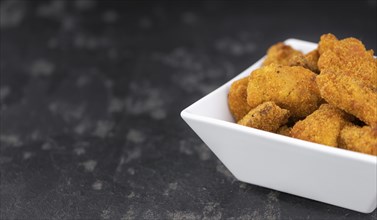 Chicken Nuggets as detailed close-up shot (selective focus)