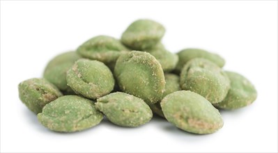 Peanuts (with Wasabi flavor) isolated on white background (selective focus, close-up shot)