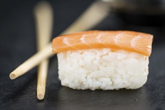 Fresh made Sushi (selective focus) on a vintage looking slate slab