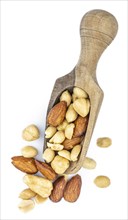 Fresh roasted nuts isolated on white background as close up shot (selective focus)