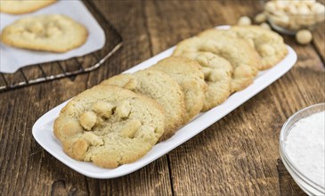 Portion of Macadamia Cookies as detailed close-up shot, selective focus