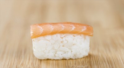 Some fresh made Sushi on a wooden table (selective focus, close-up shot)