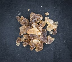 Slate slab with brown Rock Candy (close-up shot, selective focus)