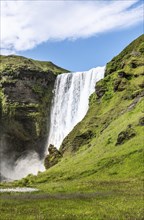 Skogafoss waterfall in southern Iceland during a summer day