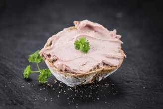 Liverwurst Sandwich on a vintage background as detailed close-up shot (selective focus)