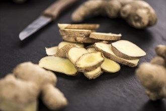 Some fresh Ginger Slices (selective focus, close-up shot)