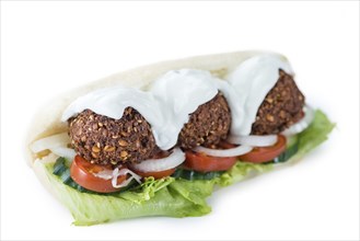 Falafel Sandwich (close-up shot) isolated on white background