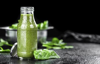 Freshly made spinach smoothie (detailed close up shot, selective focus)