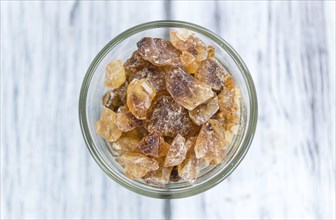 Portion of brown Rock Candy as detailed close-up shot (selective focus)