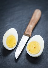 Portion of halved Eggs as detailed close-up shot (selective focus)