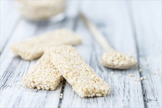 Some fresh made Quinoa Bars on vintage background (close-up shot)