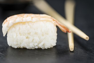 Portion of fresh made Sushi (detailed close-up shot, selective focus)