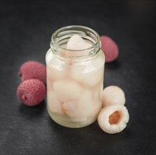 Preserved Lychees on a vintage background as detailed close-up shot (selective focus)