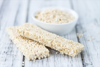 Portion of homemade Quinoa Bars (selective focus, close-up shot)