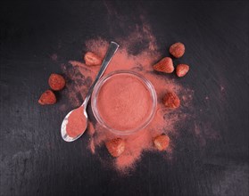 Some Instant Strawberries on a vintage slate slab, selective focus