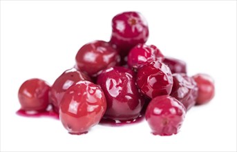 Cranberries (preserved) isolated on white background (selective focus, close-up shot)