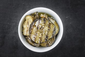 Grilled Zucchinis on a vintage background as detailed close-up shot (selective focus)