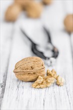 Walnuts on a vintage background as detailed close-up shot (selective focus)