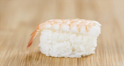 Portion of fresh made Sushi (detailed close-up shot, selective focus)