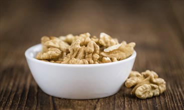 Portion of fresh Walnut kernels (close-up shot, selective focus)