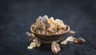 Slate slab with brown Rock Candy (close-up shot, selective focus)