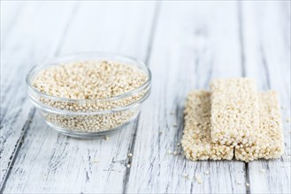 Some fresh made Quinoa Bars on vintage background (close-up shot)