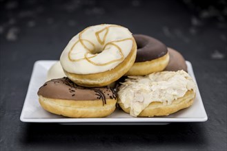 Fresh made Donuts as detailed close-up shots (selective focus)