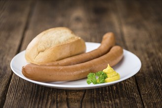 Wiener Sausages on a vintage background as detailed close-up shot (selective focus)