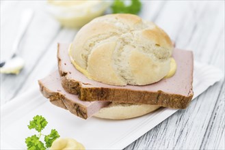 Homemade Meat Loaf on vintage background (selective focus, close-up shot)