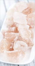 Pink himalayan Salt (selective focus) asdetailed close-up shot