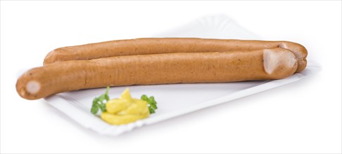 Portion of Wiener Sausages (as close-up shot) isolated on white background