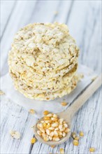 Some fresh made Corn Waffles on wooden background (selective focus)