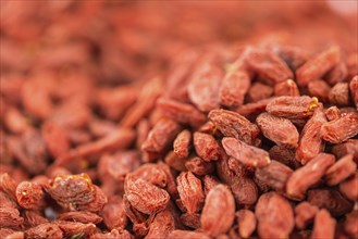 Goji Berries on a vintage background as detailed close-up shot (selective focus)