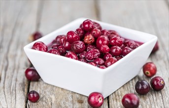 Portion of healthy Cranberries (preserved) (selective focus, close-up shot)