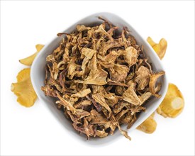 Portion of Dried Chanterelles as detailed close-up shot isolated on white background