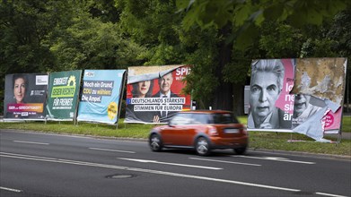 Election posters of the parties Alliance Sahra Wagenknecht, Greens, CDU, SPD and FDP stand on the