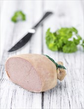 Portion of fresh made Liverwurst (close-up shot, selective focus)