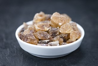 Slate slab with brown Rock Candy (close-up shot, selective focus)