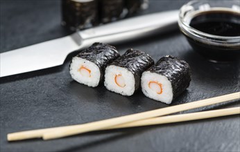 Portion of fresh made Sushi (detailed close-up shot, selective focus)