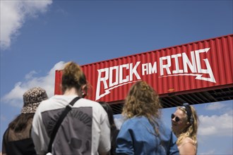 Festival visitors in front of the entrance to the infield at the Rock am Ring Festival, Nürburgring